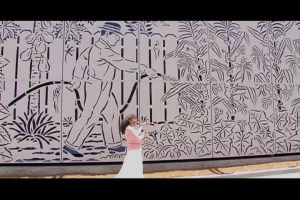 Carmen with abuelo mural